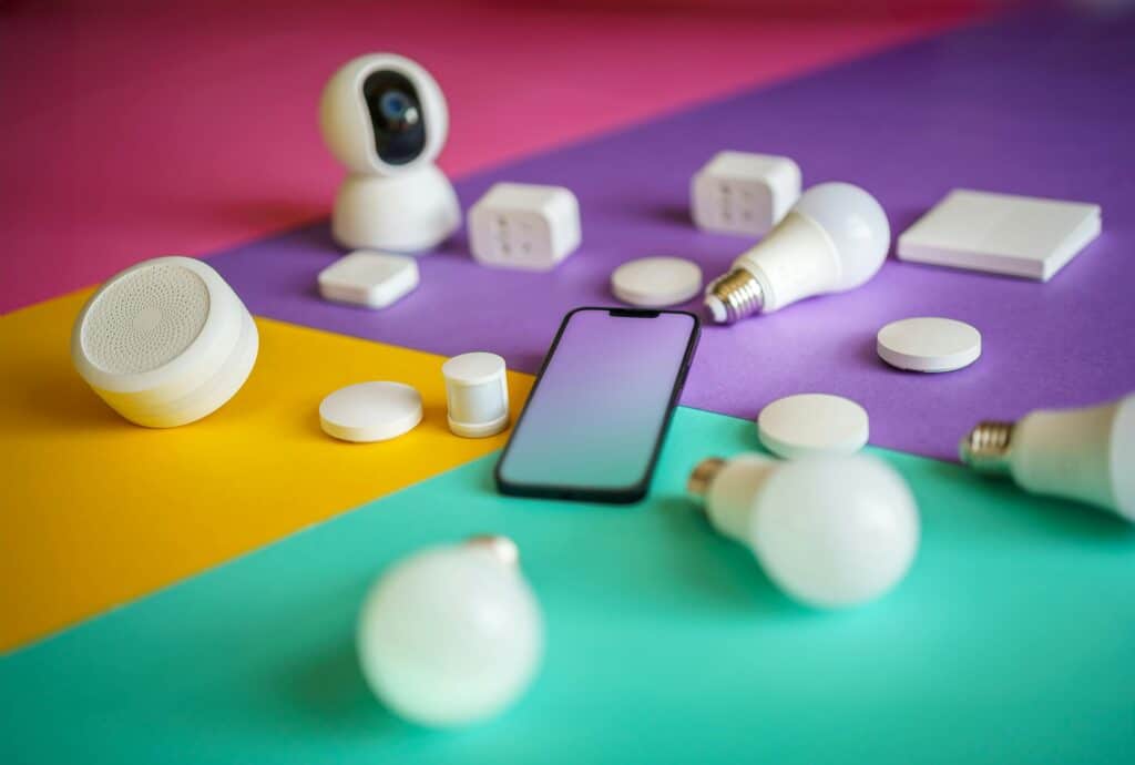 Smart home devices connected via phone for setup and IT support services.