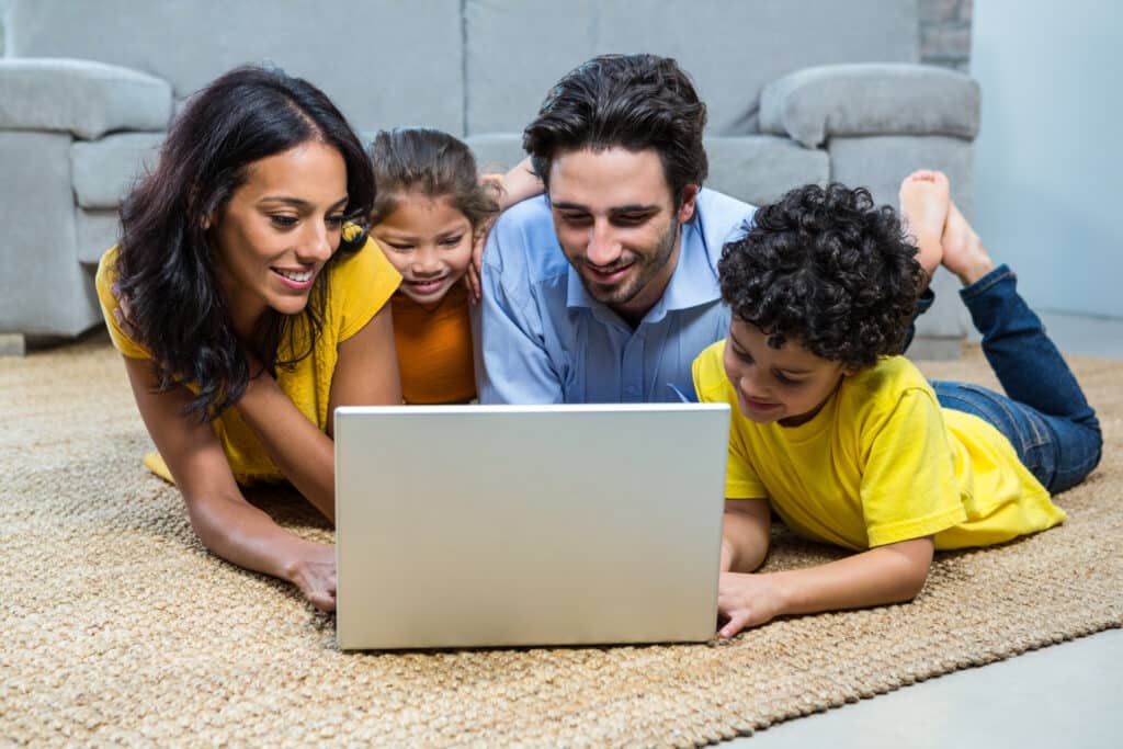 Family enjoying protected devices with SysPros tech support membership.